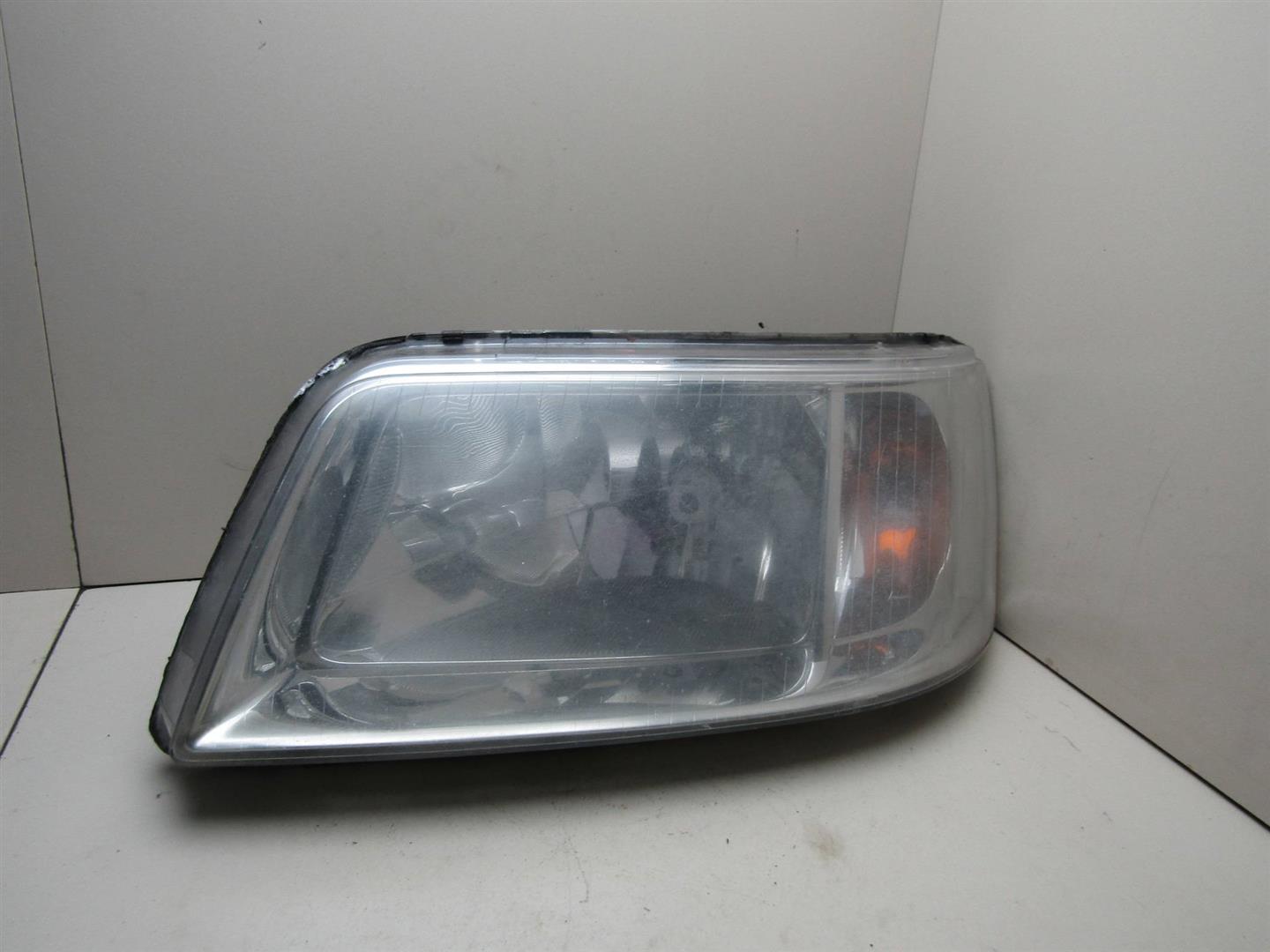 Фара левая VW Transporter T5 2003-2015 7H1941015S