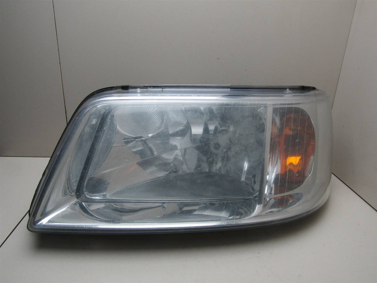 Фара левая VW Transporter T5 2003-2015 7H1941015S